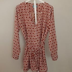 Edna's Rose burnt orange long sleeve belted blouse.